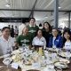 First Lady Liza Araneta Marcos joins Go Negosyo Executive Director Mina Akram (standing, at right) who represented Go Negosyo founder Joey Concepcion at the LAB for All social and medical services caravan in Bayambang, Pangasinan last February 6, 2025. With them are entrepreneurship mentors Angkas CEO George Royeca (standing) and PCCI Pangasinan President Marcos Aquino (seated), as well as other supporters of the First Lady’s initiative.