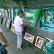 Local Filipino artist selling his artwork on the streets. Photo Credit: filipinotimes.net