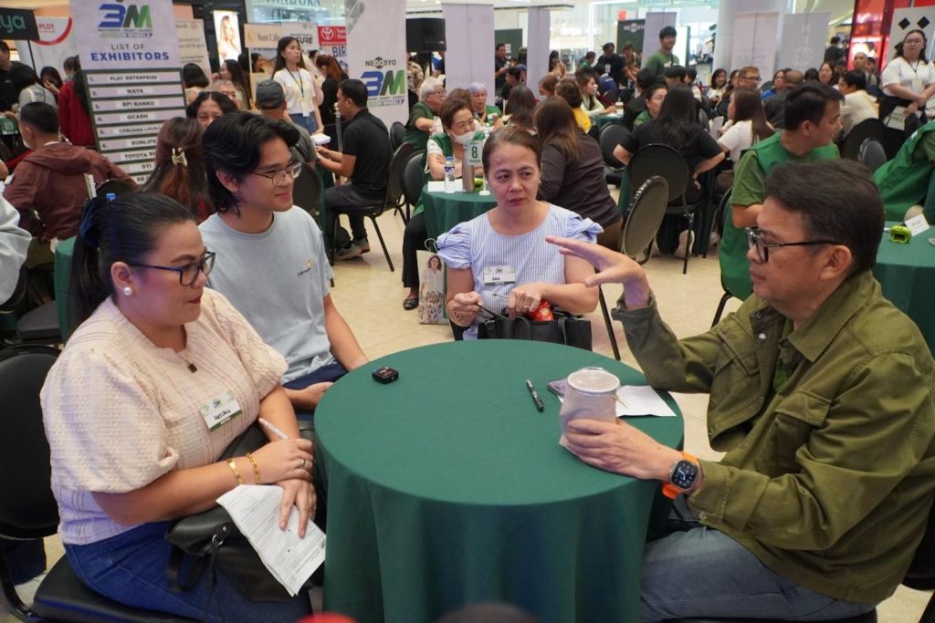 Go Negosyo founder Joey Concepcion mentoring MSMEs during the Go Negosyo 3M on Wheels at SM Megamall, Mandaluyong City.