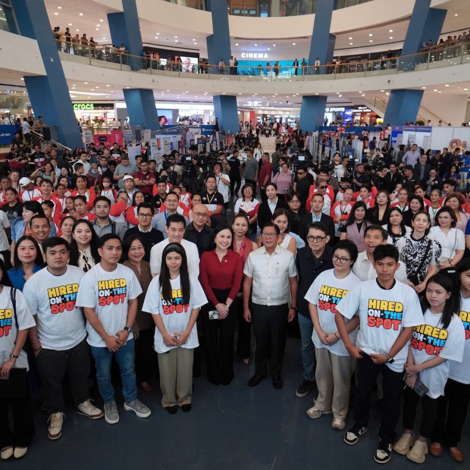 TRABAHO AT NEGOSYO. President Ferdinand Marcos Jr., together with Go Negosyo founder and Private Sector Advisory Council (PSAC) Education and Jobs Group lead Joey Concepcion, Dept. of Trade and Industry Sec. Cris Roque, Dept. of Information and Communications Technology Sec. Henry Aguda, Dept. of Labor and Employment Usec. Carmela Torres, Pasay City Mayor Emi Calixto-Rubiano, SM Malls President Steven Tan, and PSAC council member and SM Investments Vice Chair Tessie Sy Coson (not in photo) welcome job seekers to the SM Job Fair + Skills e-Hub, Holiday Career Fest last December 11, 2025 at the SM Mall of Asia Music Hall in Pasay City.