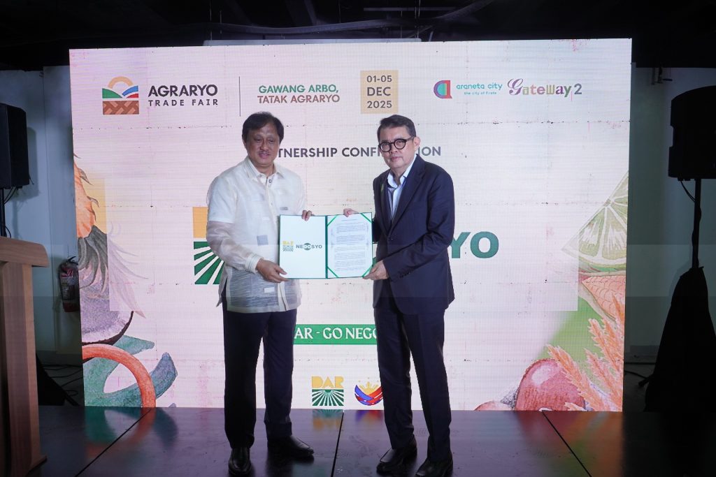 Department of Agrarian Reform Secretary Conrado Estrella III and Go Negosyo founder Joey Concepcion present the Memorandum of Agreement at the Agraryo Trade Fair Opening Ceremony last December 1, 2025 at the Araneta Coliseum in Quezon City. The agreement leverages the complementary strengths of the public and private sectors to achieve food security through improved farm productivity.
